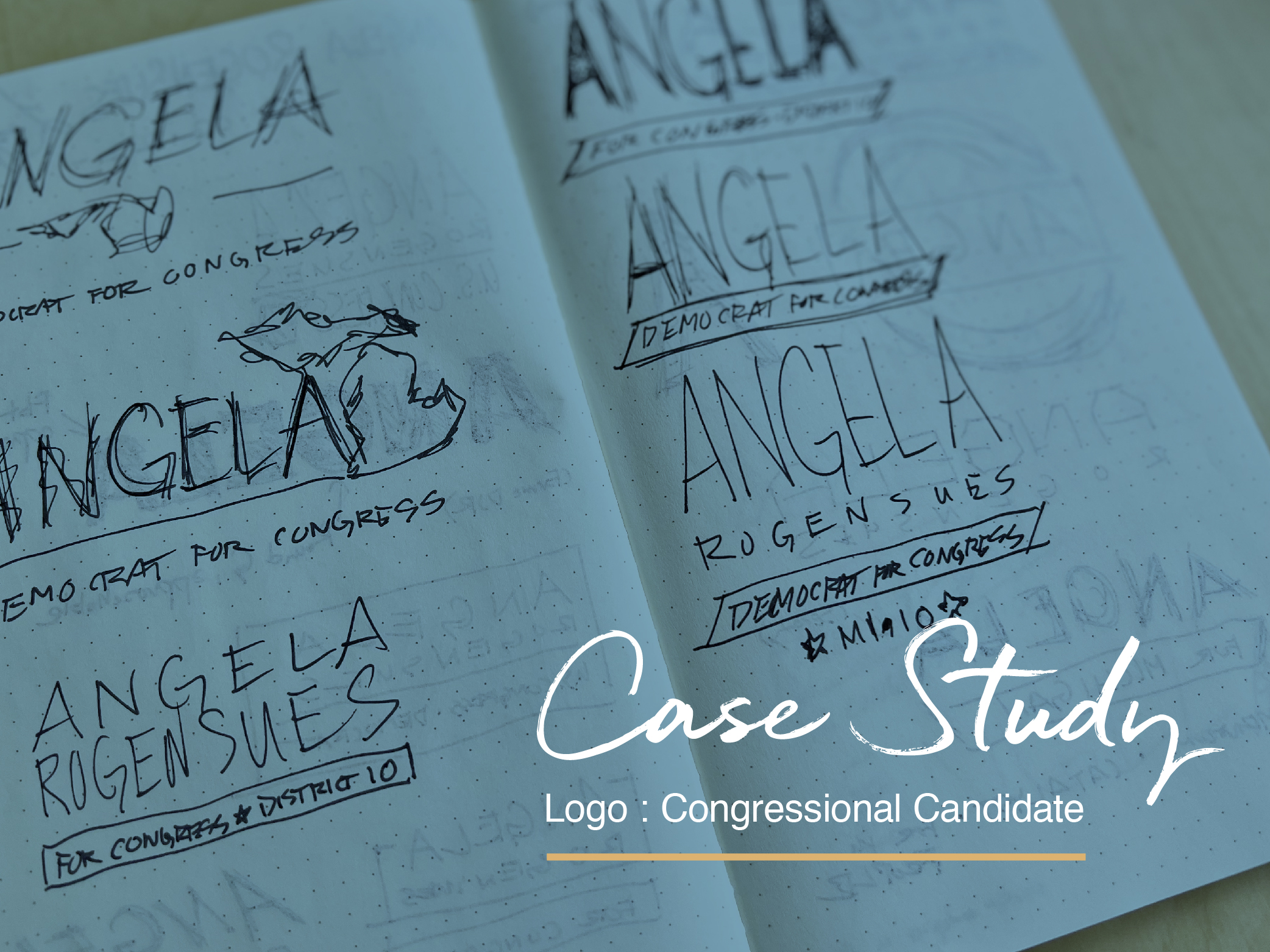Open notebook with sketches of Angela Rogensues logo designs
