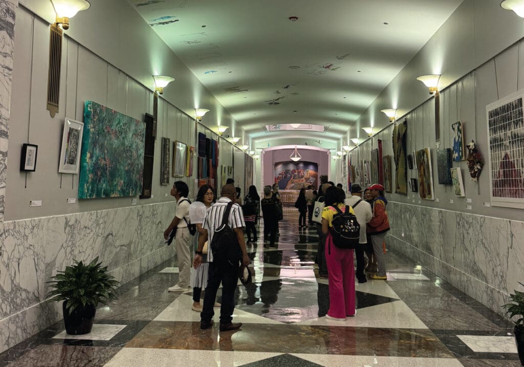 Filipino American Art. Harold Washington Library in Chicago. Ida B. Wells Corridor. Artist Aireen Arellano's family and fellow artists at Halo Halo Project Exhibit. Filipino American History Month.